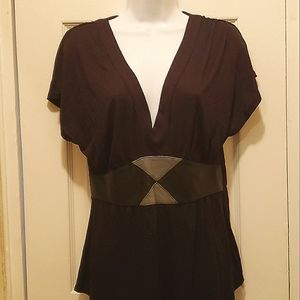 Velvet Heart blouse. Made out of Rayon with Leather embellishment at the waist.